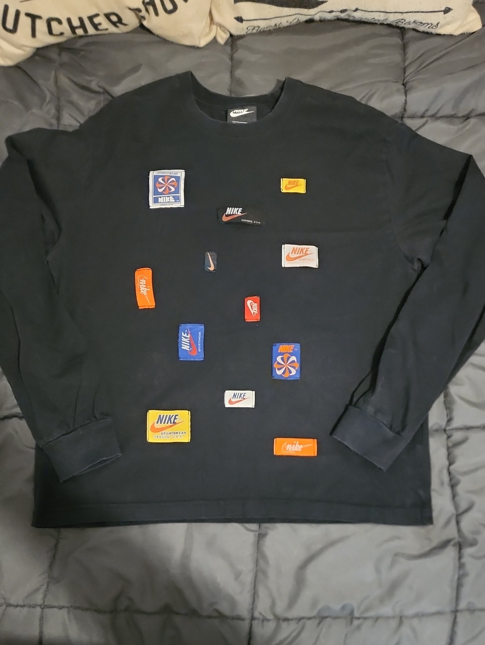 Nike Black Crewneck Sweatshirt with Colorful Logo Patches